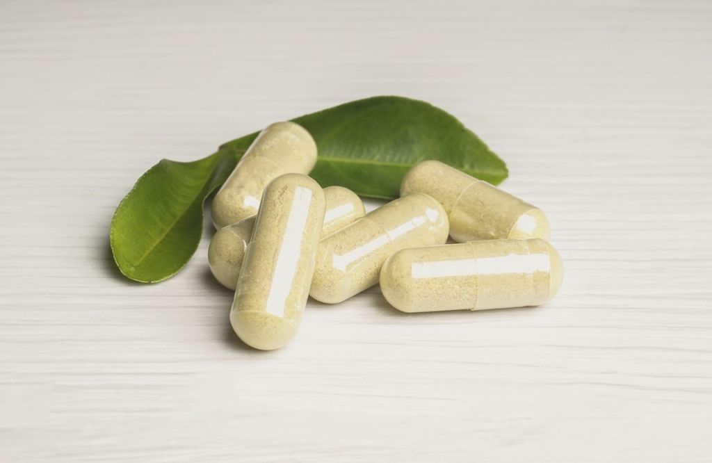 vitamins laid out aesthetically for hair growth 